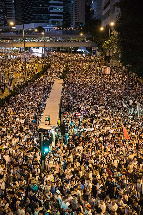 Protesters attend a rally against a controversial extradition law proposal in Hong Kong on June 9, 2019. - Hong Kong witnessed its largest street protest in at least 15 years on June 9 as crowds massed against plans to allow extraditions to China, a proposal that has sparked a major backlash against the city's pro-Beijing leadership. (Photo by DALE DE LA REY / AFP) (Photo credit should read DALE DE LA REY/AFP/Getty Images)